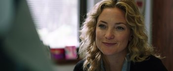 Movie still from “Wish I Was Here” (2014), directed by Zach Braff – A person with long blonde hair; Close Up shot, Over the shoulder angle