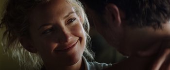 Movie still from “Wish I Was Here” (2014), directed by Zach Braff – A woman's face and a man's face; Close Up shot, Over the shoulder angle