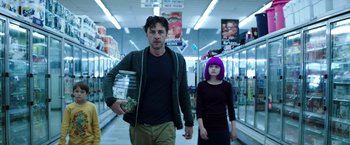 Movie still from “Wish I Was Here” (2014), directed by Zach Braff – A man and a woman walking in a grocery store; Medium shot, Low angle