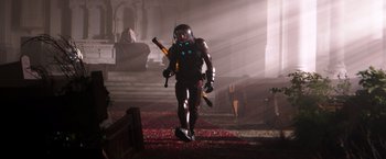 Movie still from “Wish I Was Here” (2014), directed by Zach Braff – A man in a black suit holding a sword; Wide shot, Low angle