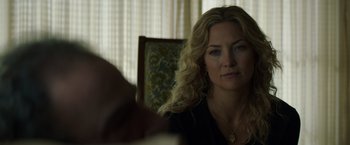 Movie still from “Wish I Was Here” (2014), directed by Zach Braff – A person sitting in a chair; Close Up shot, Over the shoulder angle