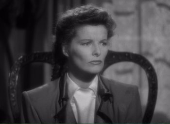 Movie still from “Without Love” (1945), directed by Harold S. Bucquet – A black - and - white photo of a woman sitting in a chair; Close Up shot, High angle