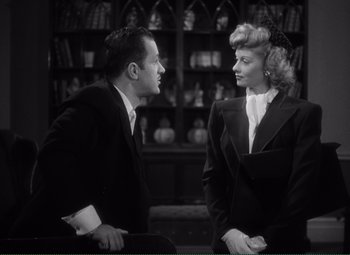 Movie still from “Without Love” (1945), directed by Harold S. Bucquet – A man and a woman talking to each other; Medium shot, Over the shoulder angle