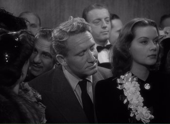 Movie still from “Without Love” (1945), directed by Harold S. Bucquet – Black and white photograph of a man and a crowd of people; Close Up shot, High angle