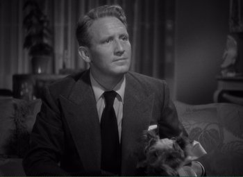 Movie still from “Without Love” (1945), directed by Harold S. Bucquet – An older man in a suit and tie; Close Up shot, High angle