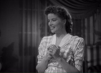 Movie still from “Without Love” (1945), directed by Harold S. Bucquet – An old black and white photo of a woman smiling; Close Up shot, High angle