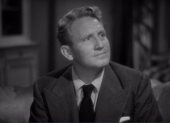 Movie still from “Without Love” (1945), directed by Harold S. Bucquet – An older man in a suit and tie; Close Up shot, High angle