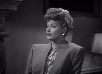 Movie still from “Without Love” (1945), directed by Harold S. Bucquet – A black - and - white photo of lucille ball; Close Up shot, Over the shoulder angle