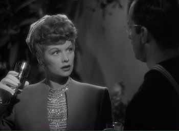 Movie still from “Without Love” (1945), directed by Harold S. Bucquet – A black - and - white photo of a woman and a man; Close Up shot, Over the shoulder angle