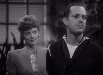 Movie still from “Without Love” (1945), directed by Harold S. Bucquet – A man and a woman standing next to each other; Close Up shot, Over the shoulder angle