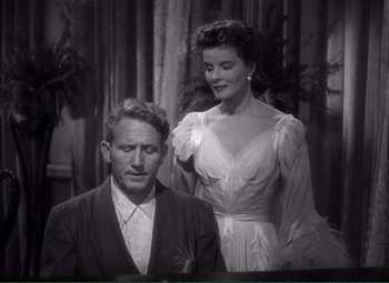 Movie still from “Without Love” (1945), directed by Harold S. Bucquet – A man and a woman are sitting next to each other; Medium shot, High angle