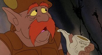 Movie still from “Wizards” (1977), directed by Ralph Bakshi – An old man with a red beard is looking at a white rabbit; Close Up shot, Over the shoulder angle