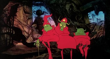 Movie still from “Wizards” (1977), directed by Ralph Bakshi – A group of cartoon characters sitting on top of each other; Wide shot, Low angle