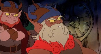 Movie still from “Wizards” (1977), directed by Ralph Bakshi – An animated picture of a bearded man wearing a hat; Close Up shot, Low angle