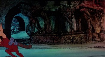 Movie still from “Wizards” (1977), directed by Ralph Bakshi – A painting of a brick wall with trees in the background; Wide shot, Low angle