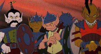 Movie still from “Wizards” (1977), directed by Ralph Bakshi – A group of people with helmets and swords in front of a red background; Medium shot, High angle
