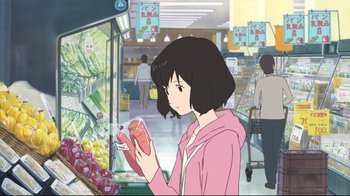 Movie still from “Wolf Children” (2012), directed by Mamoru Hosoda – A woman holding a hot dog while standing in front of a store; Medium shot, Over the shoulder angle
