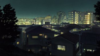 Movie still from “Wolf Children” (2012), directed by Mamoru Hosoda – A view of a city at night from a hill; Extreme Wide shot, High angle
