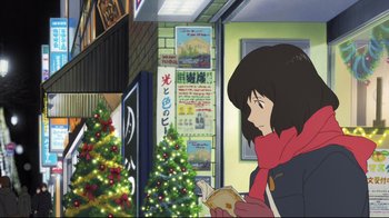 Movie still from “Wolf Children” (2012), directed by Mamoru Hosoda – A woman standing in front of a christmas tree; Medium shot, Over the shoulder angle