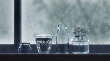 Movie still from “Wolf Children” (2012), directed by Mamoru Hosoda – A window sill with a glass of water and two jars; Extreme Close Up shot, Low angle