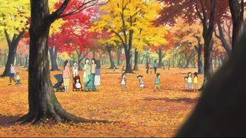 Movie still from “Wolf Children” (2012), directed by Mamoru Hosoda – A group of people standing in a field with trees; Extreme Wide shot, High angle