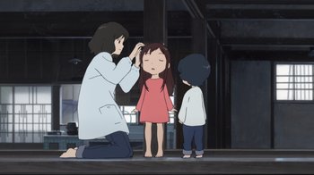 Movie still from “Wolf Children” (2012), directed by Mamoru Hosoda – An animated scene of a woman and two children; Medium shot, Over the shoulder angle