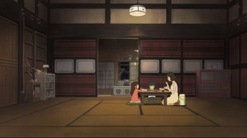 Movie still from “Wolf Children” (2012), directed by Mamoru Hosoda – A group of people sitting around a table; Extreme Wide shot, High angle