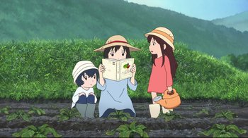 Movie still from “Wolf Children” (2012), directed by Mamoru Hosoda – Two girls and a boy are reading a book; Wide shot, High angle