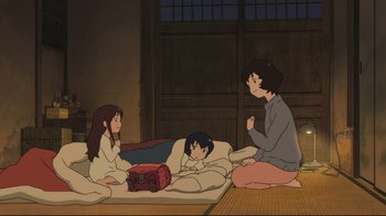 Movie still from “Wolf Children” (2012), directed by Mamoru Hosoda – A group of people sitting on the floor; Wide shot, High angle