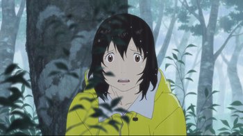 Movie still from “Wolf Children” (2012), directed by Mamoru Hosoda – A woman in a yellow raincoat standing in front of trees; Medium shot, Low angle