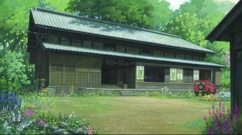 Movie still from “Wolf Children” (2012), directed by Mamoru Hosoda – An asian building with a lot of flowers around it; Extreme Wide shot, Low angle