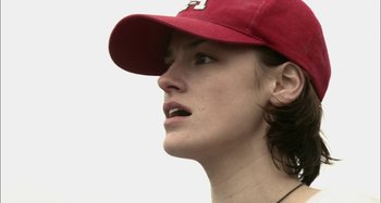 Movie still from “Wolf Creek” (2005), directed by Greg McLean – A person wearing a hat; Close Up shot, Low angle
