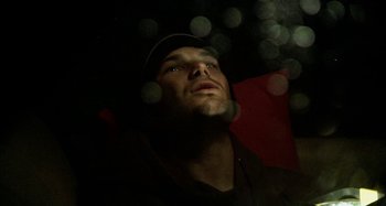 Movie still from “Wolf Creek” (2005), directed by Greg McLean – A person looking up at the sky; Close Up shot, Low angle