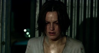 Movie still from “Wolf Creek” (2005), directed by Greg McLean – A person crying; Close Up shot, Over the shoulder angle