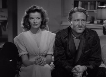 Movie still from “Woman of the Year” (1942), directed by George Stevens – A man and a woman sitting next to each other; Medium shot, High angle