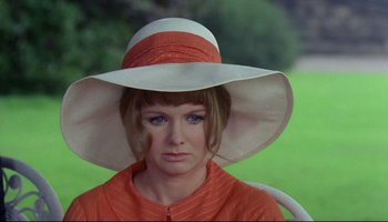 Movie still from “Women in Love” (1969), directed by Ken Russell – A person wearing a hat; Close Up shot, High angle