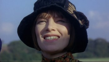 Movie still from “Women in Love” (1969), directed by Ken Russell – A person wearing a hat; Close Up shot, Low angle