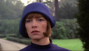 Movie still from “Women in Love” (1969), directed by Ken Russell – A person wearing a hat; Close Up shot, Low angle