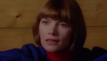 Movie still from “Women in Love” (1969), directed by Ken Russell – A person wearing a sweater; Close Up shot, Low angle