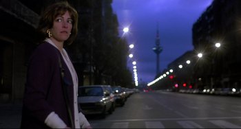 Movie still from “Women on the Verge of a Nervous Breakdown” (1988), directed by Pedro Almodóvar – A woman standing on the side of a street; Medium shot, Low angle