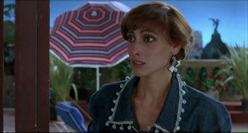 Movie still from “Women on the Verge of a Nervous Breakdown” (1988), directed by Pedro Almodóvar – A person wearing a jacket; Close Up shot, Over the shoulder angle