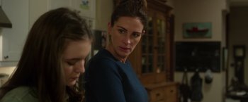 Movie still from “Wonder” (2017), directed by Stephen Chbosky – A woman standing next to another woman in a room; Close Up shot, Over the shoulder angle