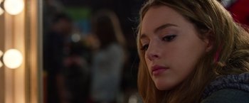 Movie still from “Wonder” (2017), directed by Stephen Chbosky – A young woman's face; Close Up shot, Over the shoulder angle