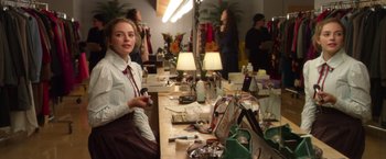 Movie still from “Wonder” (2017), directed by Stephen Chbosky – A woman sitting in front of a mirror in a room; Medium shot, Over the shoulder angle