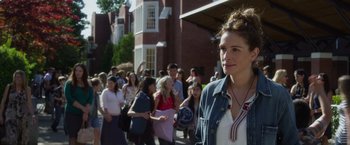 Movie still from “Wonder” (2017), directed by Stephen Chbosky – A group of people walking down a street; Medium shot, Over the shoulder angle