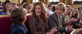 Movie still from “Wonder” (2017), directed by Stephen Chbosky – A group of people that are sitting in a room together; Medium shot, Over the shoulder angle