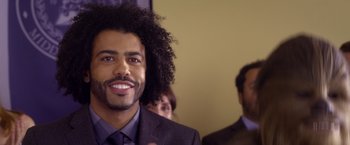 Movie still from “Wonder” (2017), directed by Stephen Chbosky – A person wearing a suit and tie; Close Up shot, Over the shoulder angle