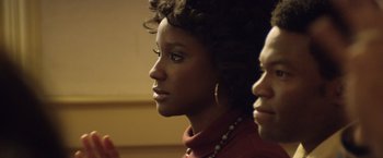 Movie still from “Woodlawn” (2015), directed by Jon Erwin – A woman in a red shirt and a man in a red shirt; Close Up shot, Over the shoulder angle