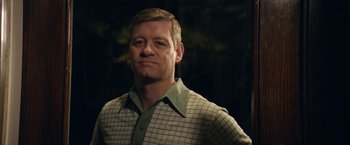 Movie still from “Woodlawn” (2015), directed by Jon Erwin – A person wearing a plaid shirt; Close Up shot, Over the shoulder angle
