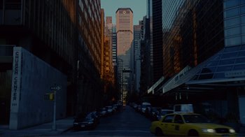Movie still from “World Trade Center” (2006), directed by Oliver Stone – A city street filled with lots of traffic at dusk; Extreme Wide shot, High angle